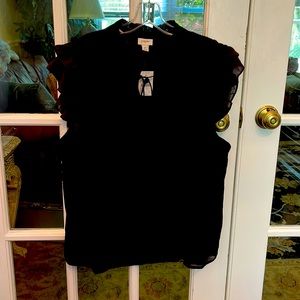 JCrew XL NWT sleeveless black shirt with ruffle on shoulders.